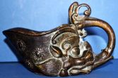 Antique 19th Century Chinese bronze libation cup, lion mask decoration, c1880