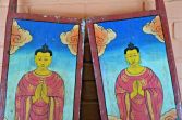 Pair of Nepalese hand painted Buddha window shutters, c1890